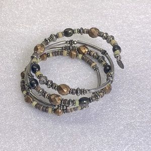 Copper and silver tone flexible bracelet